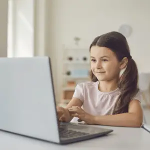 girl learning at laptop